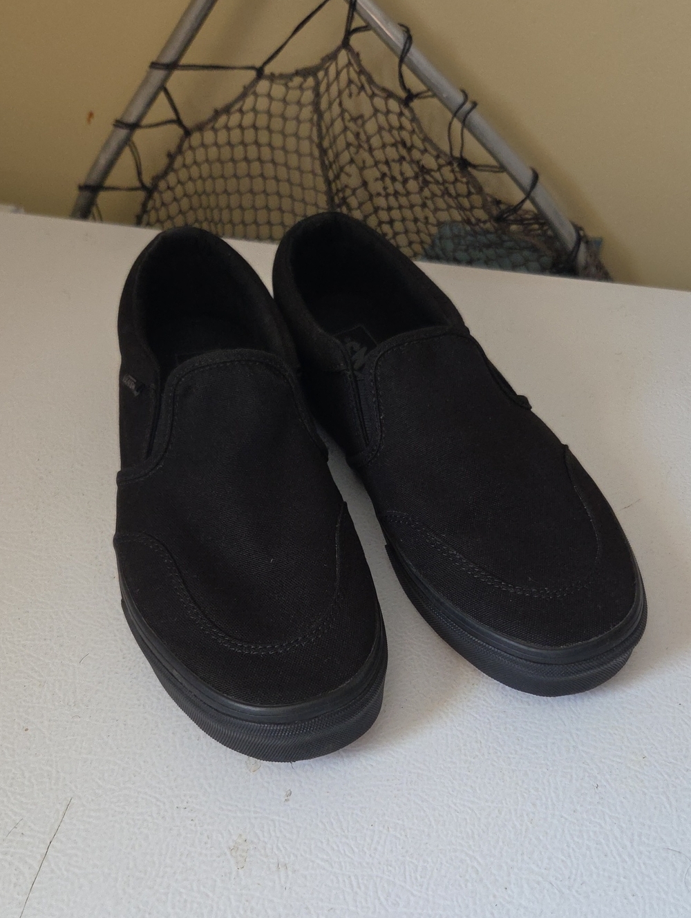 Vans Men's Slip-On Canvas Sneakers in Black